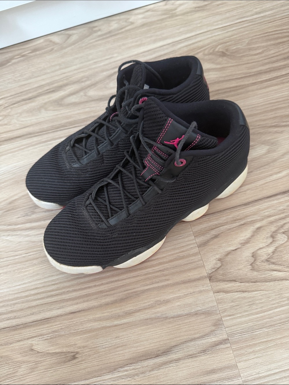 Jordan Women's Black Sneakers with Pink Accents